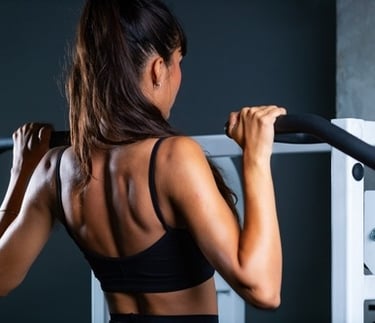 a woman using an exercise machine