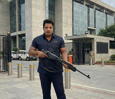 Elite Personal Security Officer (PSO) with a licensed firearm for executive protection in Delhi NCR.
