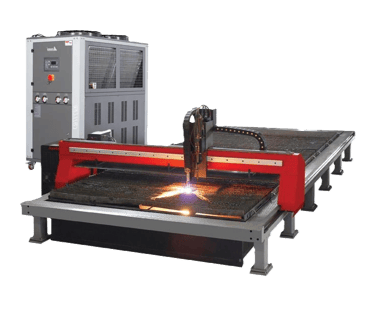 Industrial CNC plasma cutting machine with sparks and a process chiller behind