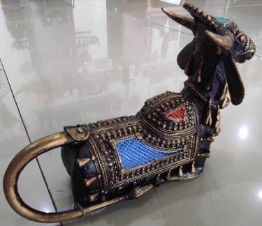  "Sitting brass designer bull figurine with vibrant red and blue detailing – ethnic brass art-for export markets"