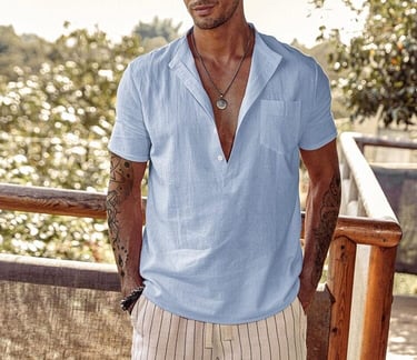 a man in a sky blue shirt and shorts