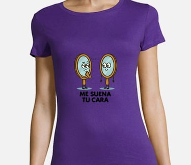 a woman wearing a purple shirt with a pair of peanut butter cookies