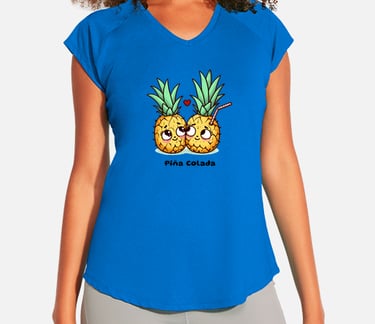a woman wearing a blue shirt with a pineapple on it