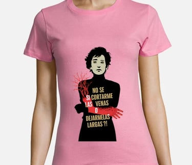 a woman wearing a pink shirt with a red scarf and a black shirt