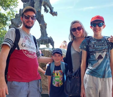 tadzik family next to fire dragon krakow