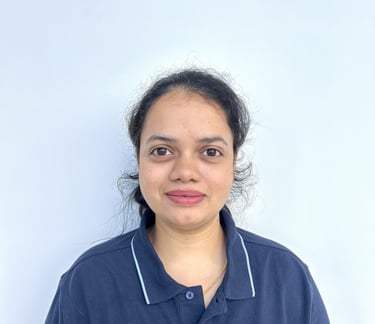 a woman in a blue shirt and a white shirt