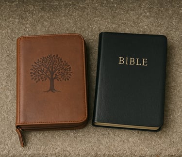 Two Bibles sitting on a stone platform