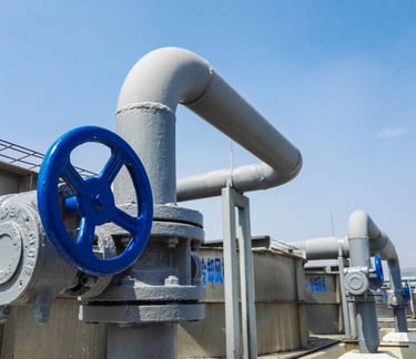 blue valve and a grey pipe
