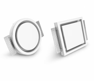 ERGOVENT RONDO and KVADRO concealed diffusers shown side by side, round and square white models with perforated side vanes