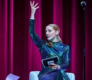 Image of Layla Claire on an opera stage during a live performance