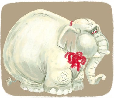 a white elephant with a red ribbon around its neck