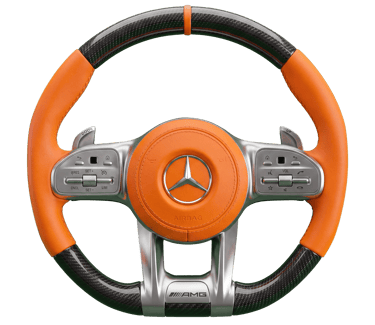 Custom Mercedes-AMG steering wheel featuring orange leather grips and carbon fiber trim.