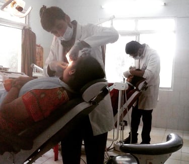 smeet performing a dental treatment on a patient