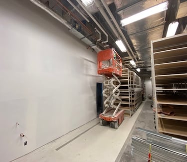 scissor lift inside of storage area