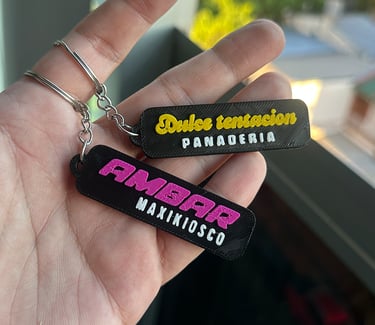 Custom 3D printed business keychains for Dulce Tentacion panaderia and Ambar maxikiosco.