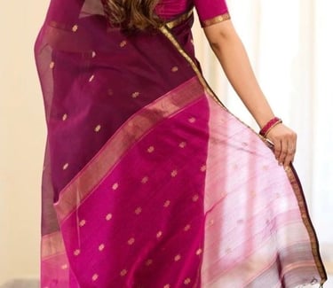 Woman from behind wearing a purple chanderi silk saree with gold zari border and floral motifs.