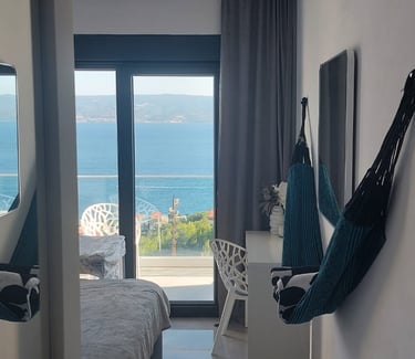 Villa Fay bedroom with a view of the ocean