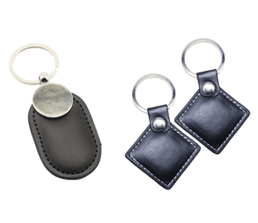 Jetons RFID en cuir de couleur noir et de formes losange et ovale pour serrure d'établissement hôtelier.