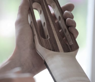 7-strings guitar head stock being made 