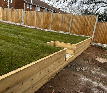 Raised timber sleeper wall in Worcester garden
