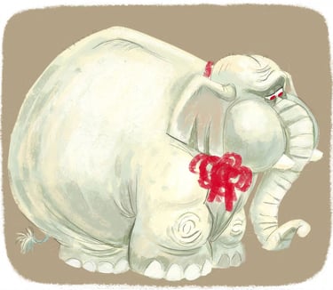 a white elephant with a red ribbon around its neck