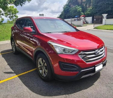 a red car parked in a parking lot