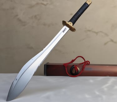 a sword laying on the ground on a wooden floor