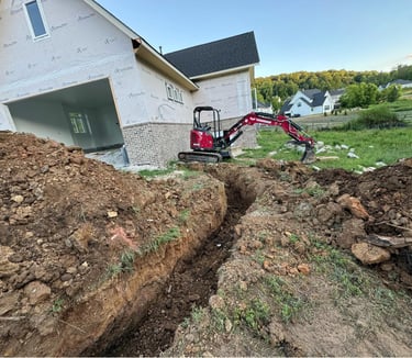excavator-digging-trench-for-utility-lines