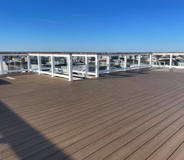 Custom framed floating rooftop decking over top of fiberglass.