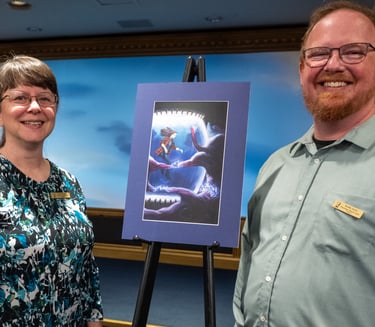 Brenda Posey with illustrator Roddy Taylor at the art reveal of "Canary"