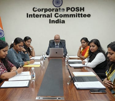 A diverse Corporate POSH Internal Committee meeting in India discussing workplace safety and compliance.