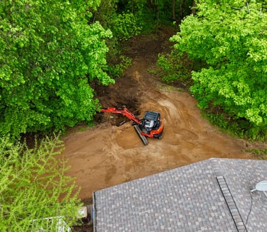 Kubota excavator digging dirt