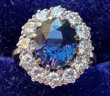4 carat colour change Ceylon sapphire & diamond cluster ring