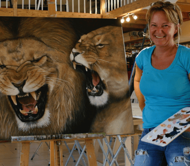 Mireille Desroches and her lions