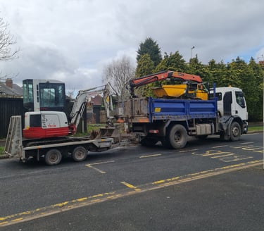 grabber and mini digger on a site in west brom