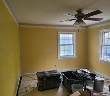 American Painting Specialist Fort Wayne, Indiana repainting a small bedroom.