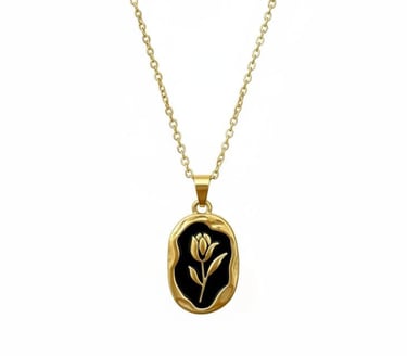 Elegant black gold tulip pendant necklace featuring a black enamel oval charm on a gold chain.