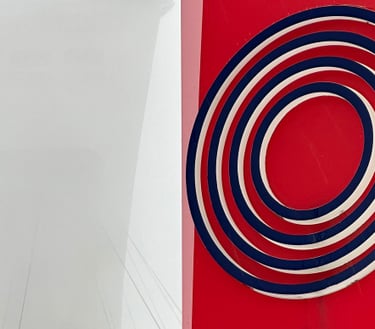 La Stade sign at Parc Olympique with Montreal tower poking through the fog behind