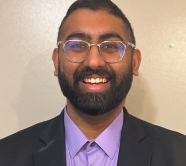 Headshot Picture of Dr. Ramakrishnan in a black blazer.