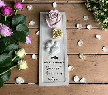 dog memorial with paw print and roses