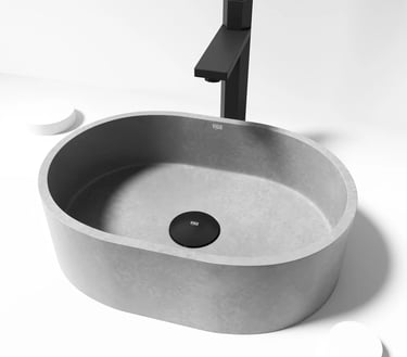 Cuba oval em concreto com válvula oculta central e torneira preta minimalista em bancada clara