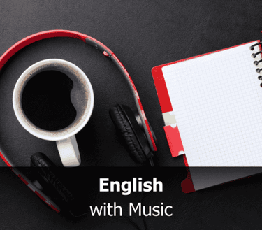 a cup of coffee and a notebook with a notebook and headphones