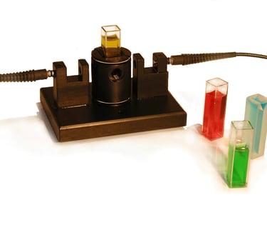Universal optics bench for use with cuvettes