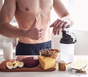 a man in the kitchen with food