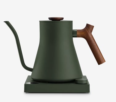 Dark green electric gooseneck kettle with a wooden handle on a matching heating base.