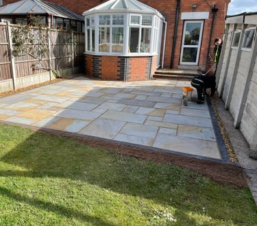 Outdoor seating area with new patio in Worcester