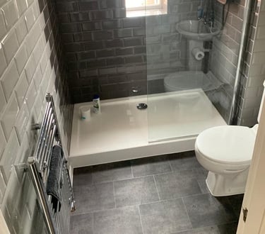 Shower installation completed by AXM Plumbing Services in Pershore
