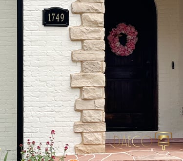 Exterior painting detail of a home in Washington Park, Denver. Features crisp white painted brick c
