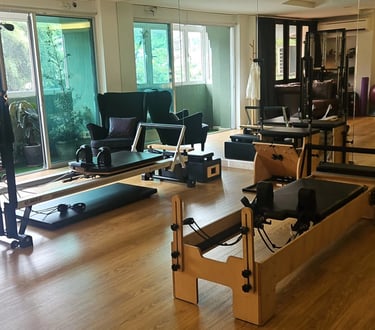 Fully equipped Pilates studio interior with reformers at The Pilates Room Bangsar