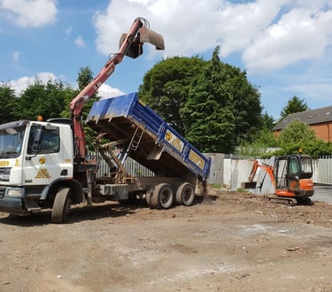grabber and mini digger on a site in west brom